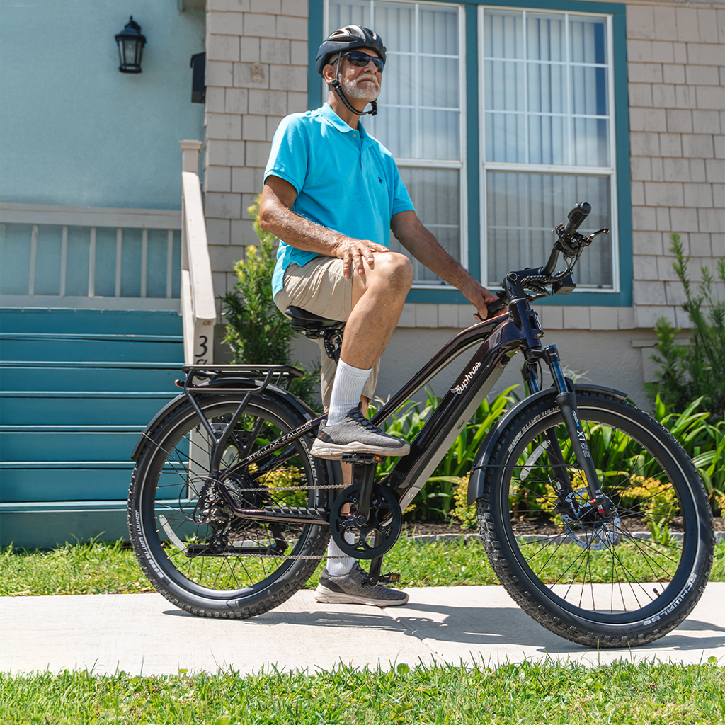 Euphree Stellar Falcon mid-step electric bike in Black Cherry on trail