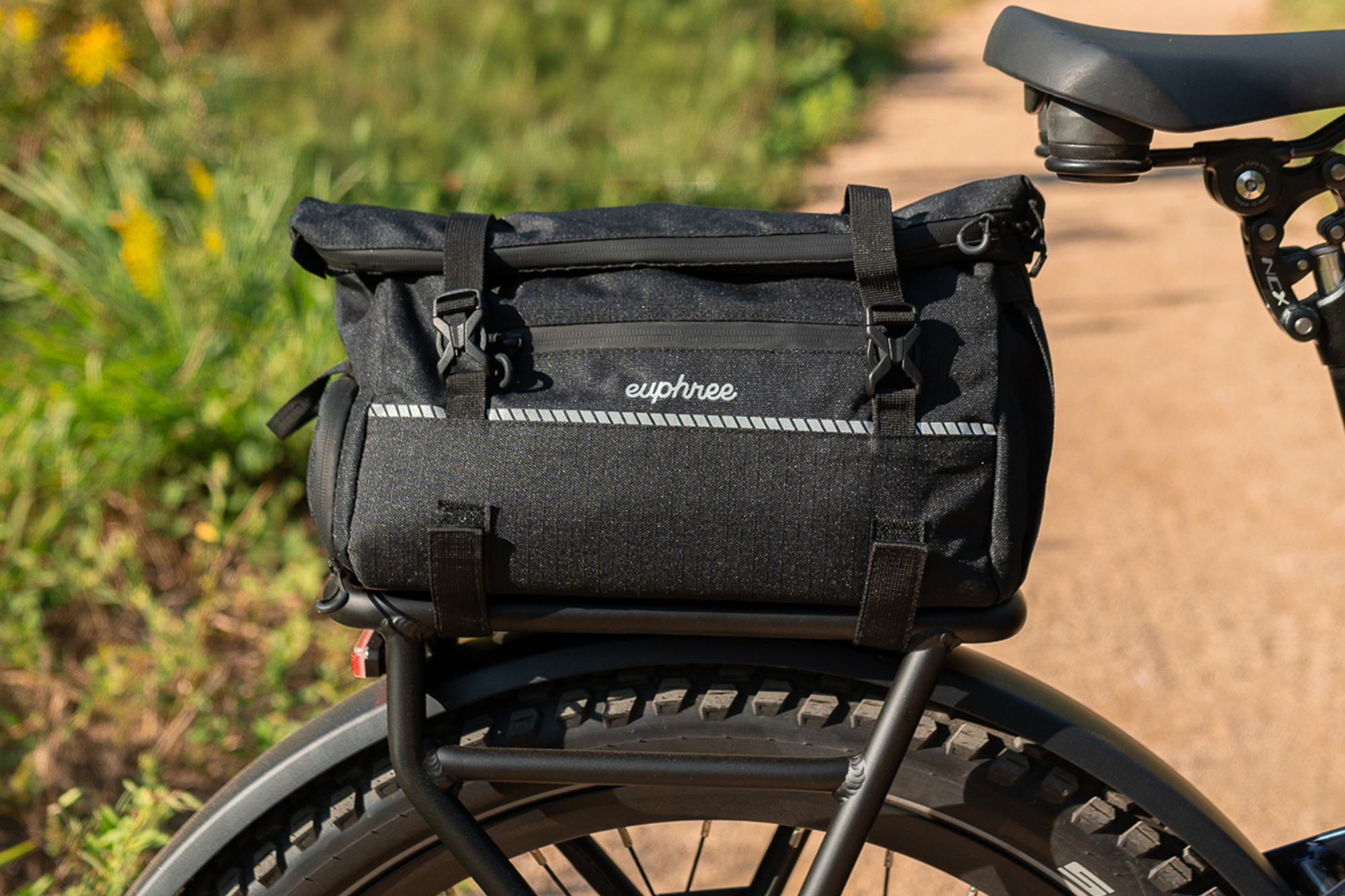 Euphree Trunk Bag mounted on rear rack with reflective trim and multiple storage compartments